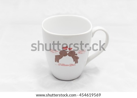 white ceramic cup with couple animation isolated on white background