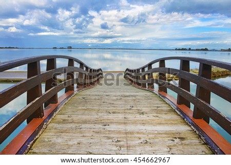 Greece, Lefkada. Wooden bridge. Royalty-Free Stock Photo #454662967