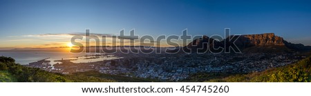 A series of pictures capturing a winter's sunrise over Cape Town, South Africa. Taken from Signal Hill overlooking the city and Table Mountain National Park.