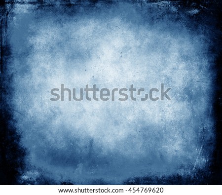Beautiful blue abstract vintage grunge background with faded central area for your text or picture