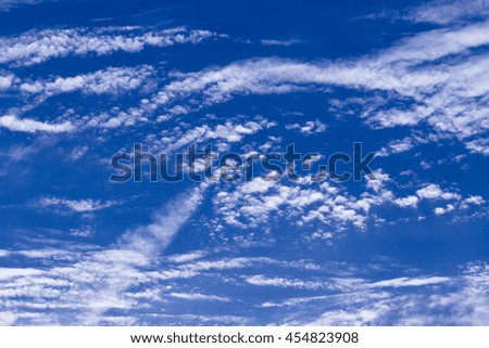 Blue summer sky with light white clouds.
