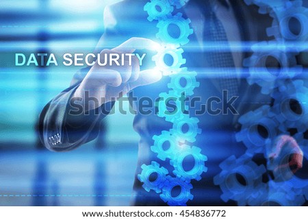 Businessman is selecting Data security on the virtual screen.