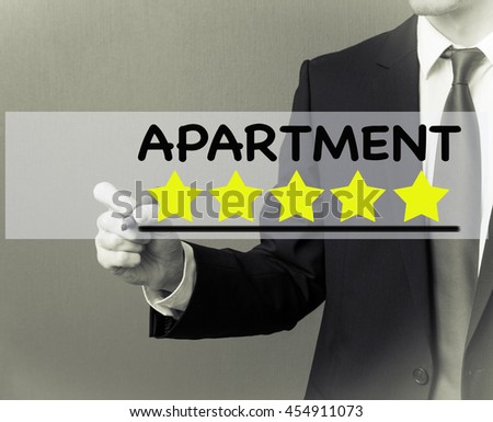 Business man writing - Apartment rating stars