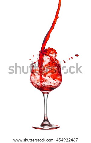
Red cocktail glass splash out on a white background.

