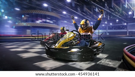 Kart crossing the finish line Royalty-Free Stock Photo #454936141