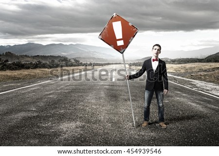 Guy showing roadsign . Mixed media