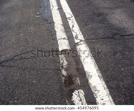 Double white marking line on the old road.