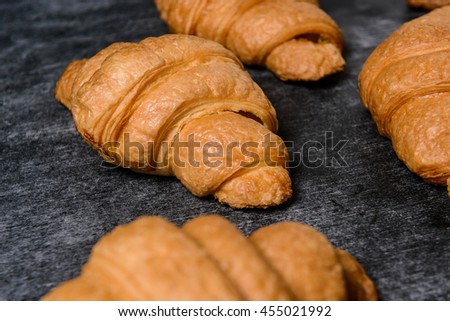 Macro picture of croissants on grey table