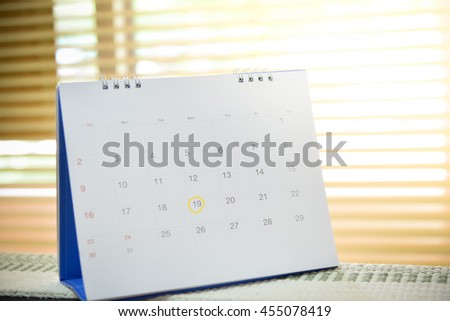 Blurred calendar page blur background marking on 19
