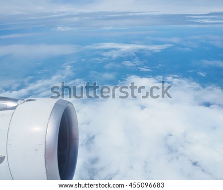 Beautiful view of airplane with blue sky and cloud.