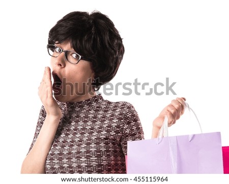 Woman with many shopping bags