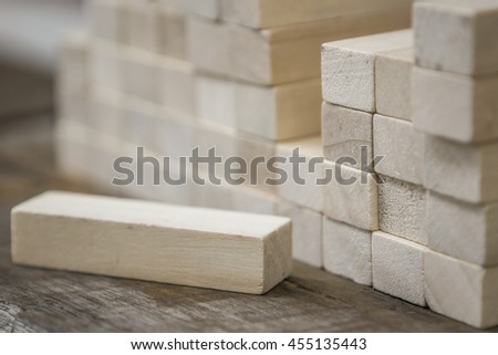 Increments concept: Many folded wooden block on table Royalty-Free Stock Photo #455135443
