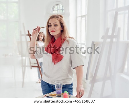 woman painter in thought