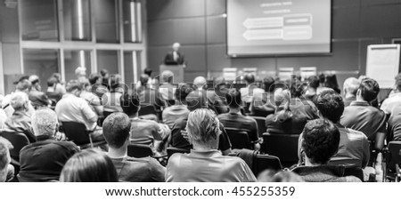 Trade union advisory committee meeting . Audience at the conference hall. Black and white image. Royalty-Free Stock Photo #455255359