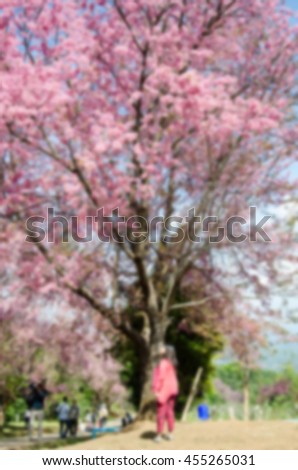 Blurred abstract background of Tourists sakura