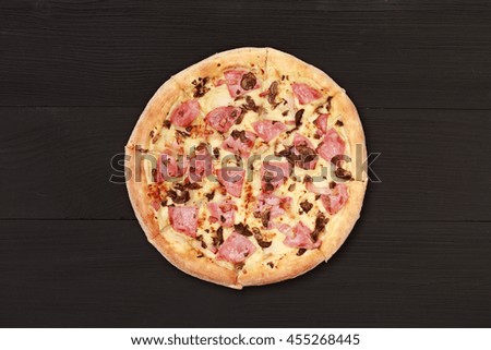 pizza on wooden background top view. Classic Italian food, fast food delicacy. Photos for advertising and place for text