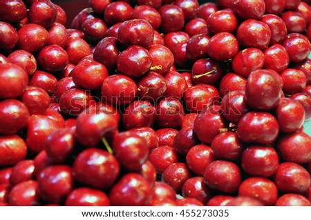 A view of red cherries in market, Cherry basket, ripe cherries