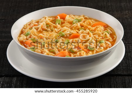 Delicious homemade  chicken noodle soup with organic chicken and vegetables,
