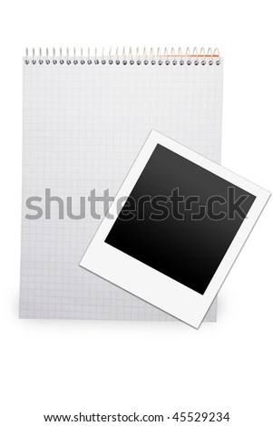 blank lined exercise book and photo frame