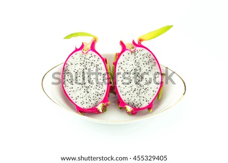 Dragon fruit in bowl on white background