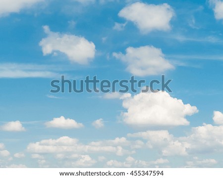 Clouds are layered arrangement beautifully in blue sky.