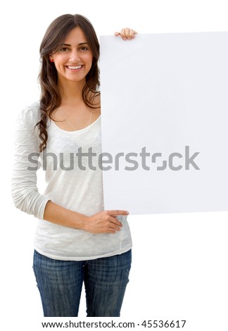 Casual woman with a banner isolated over a white background