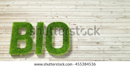 Bio made of grass on white wood background