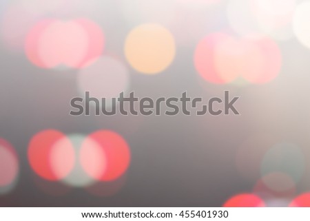 Red bokeh light on abstract gray gradient background, using for media presentation or desktop wallpaper