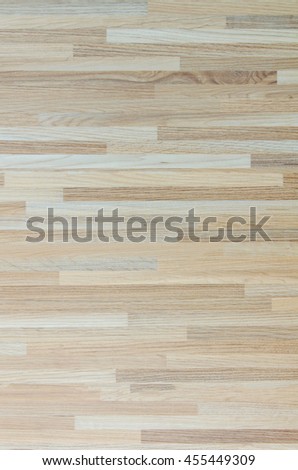 Hardwood maple basketball court floor viewed from above for natural texture pattern and background