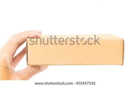 Hand hold paper box package on white background