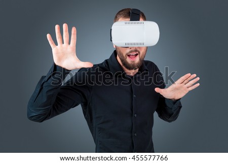 young man using a VR headset glasses