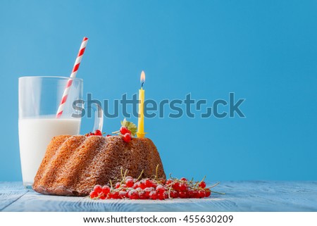 Birthday cake with  one candle on color background