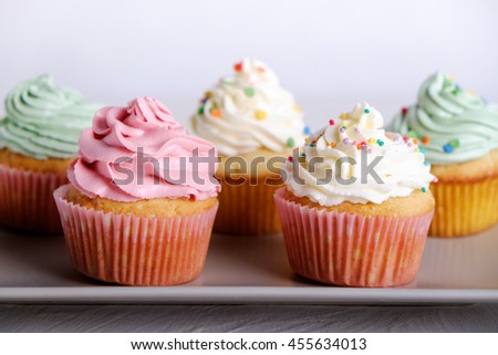 Colorful cupcakes on a plate