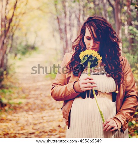  instagram of stunning pregnant woman on forest path