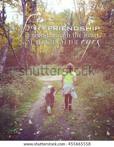 sweet instagram of young girl walking her dog on a forest path with typography