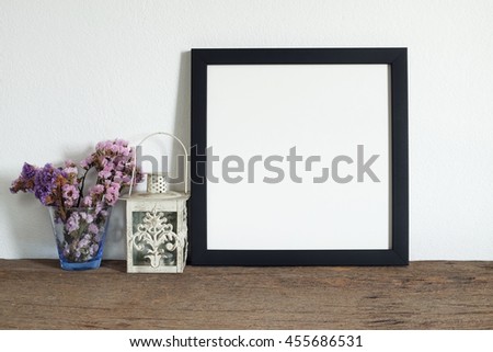 mock up blank photo frame on old wooden shelf
