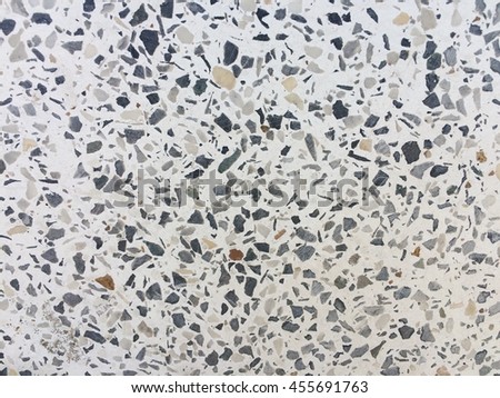 Old small stone concrete surface texture background 