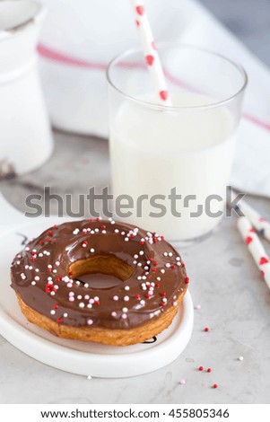 Donuts on a white wooden background. Space for text