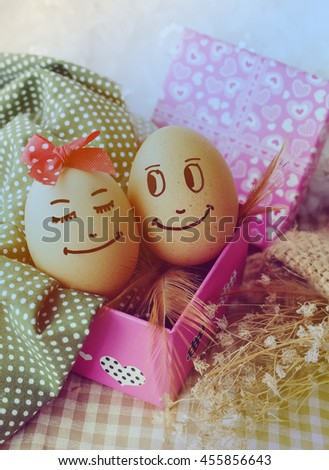 Happy couple in love. Eggs. 