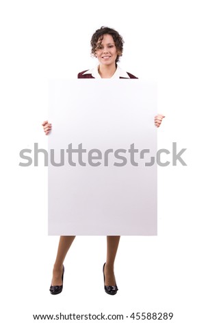 Portrait of a happy businesswoman holding white blank card against isolated white background. A beautiful young woman is holding a blank white sign. Business woman standing beside a billboard