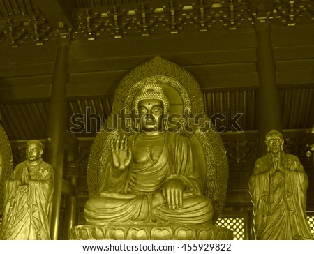 buddha in a temple, closeup of photo