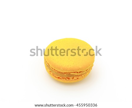 French colorful macarons on white background