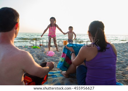 Mixed race family at the beach