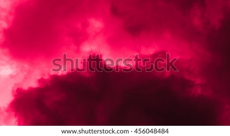 Red cloud background.