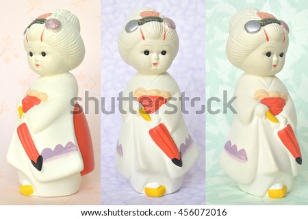 Japanese traditional doll, plaster doll, on colorful background