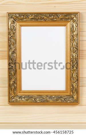 Frame on wooden wall. Interior Design. Copy space.