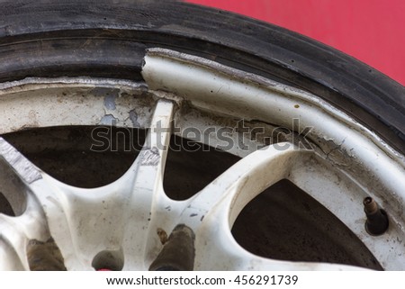 Alloy wheels of car damaged from accident ,close-up