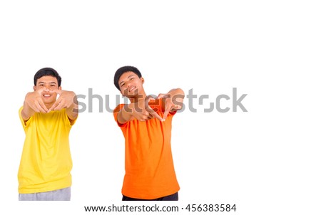 Two young asian man make heart symbol by their hands isolated
