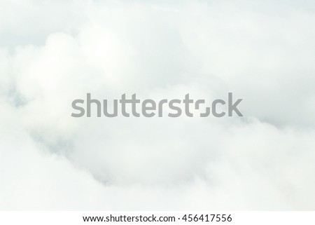 high definition skyscraper with clouds. Dramatic sky with stormy clouds.