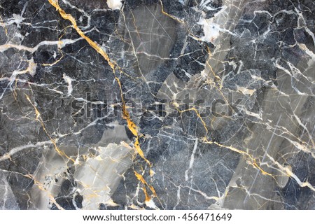Patterned natural of dark gray marble (Russia Gold) texture for design.